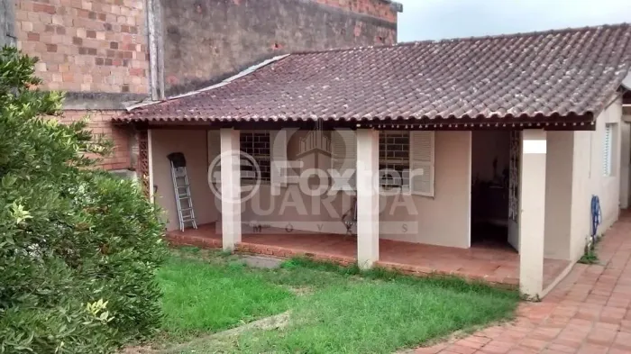 Casa à venda Avenida Edgar Pires de Castro, Hípica - Porto Alegre