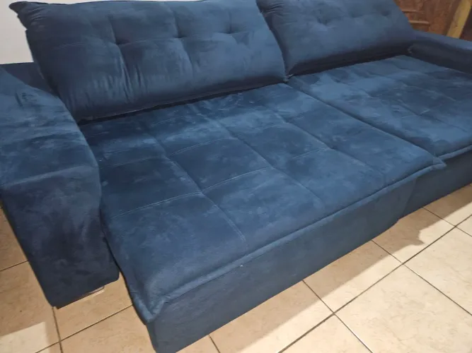 Vendo sofá3 metros azul novo .