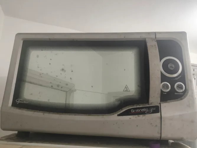 Forno elétrico sem funcionar (doação dele inteiro com as peças)
