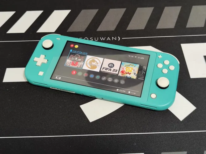 Nintendo Switch Lite 32 gb + 64 gb