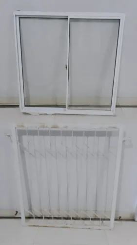 Janela de alumínio com Aranha de ferro