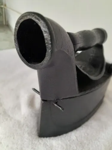 Ferro antigo a carvão