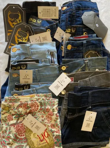 Oportunidade lote de roupas femininas e masculinas novas