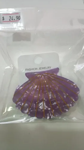 Presilha de cabelo no formato de concha