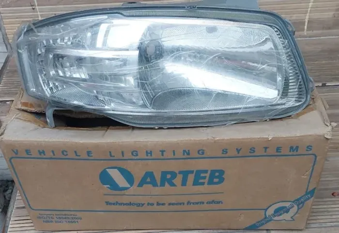 Farol Gol G4 cromado original lado direito