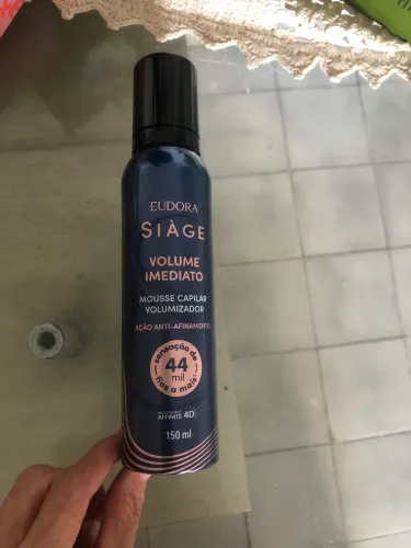 Mousse para cabelos .