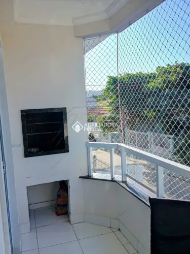 Auxiliadora Predial aluga apartamento mobiliado de 2 dormitórios, sendo 1 suite, os 2 quar
