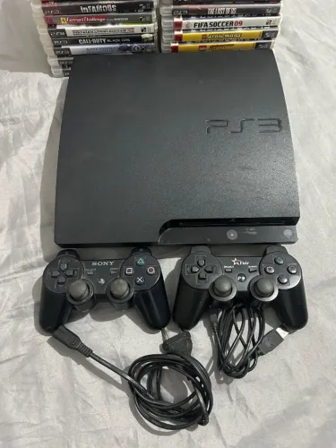 Console PS3, controles e jogos.