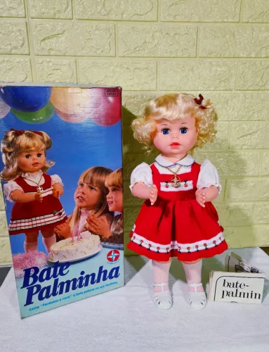 Boneca Bate Palminha da estrela na caixa e funcionando 
