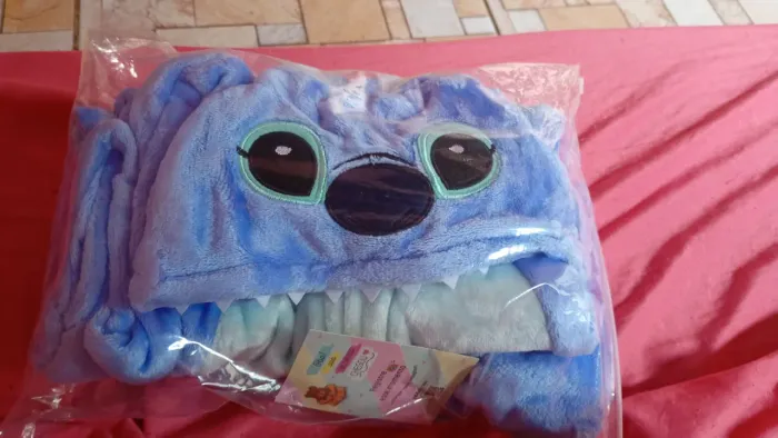 pijama do Stitch está novo nunca usou comprei não deu minha filha de 12 anos vendo por 100