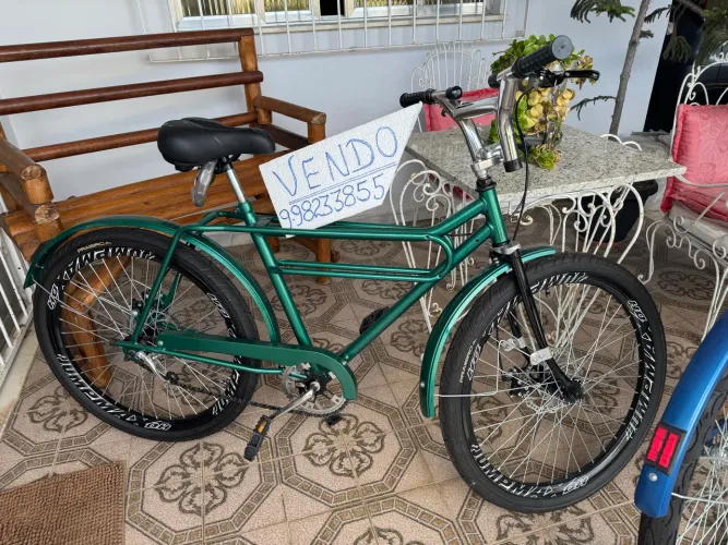 Bicicleta barra forte verde toda com rolemã nunca usada