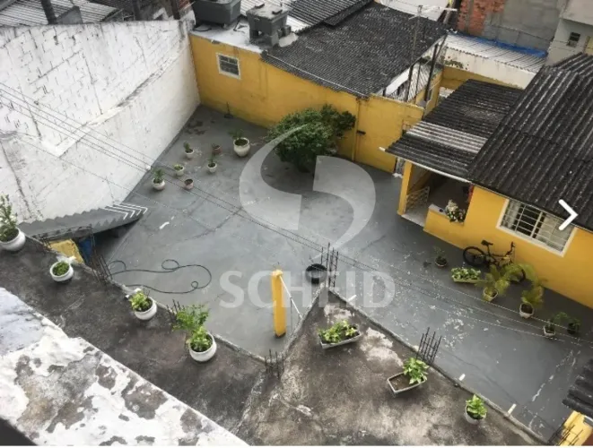 Terreno 424m² com 4 casas à venda na região da Chácara Santo Antônio