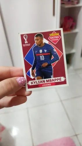 Figurinha extra ouro da copa de 2022 e 2026.