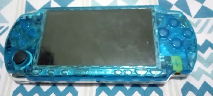 **Baixei** Psp Transparente (para peças), no estado e sem testes