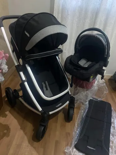 Carrinho Kiddo semi-novo com bebe conforto