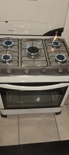 Vendo fogão esmaltec cinco bocas manual funcionando perfeitamente forno 