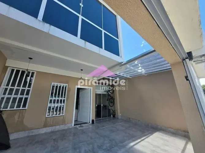 Casa com 2 dormitórios à venda, 104 m² por R$ 590.000,00 - Balneário dos Golfinhos - Carag