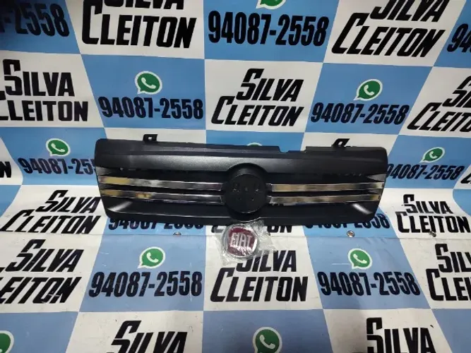 grade radiador uno fiorino 09 ate 2014 com emblema
