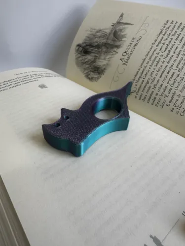 Suporte de polegar para pagina de livro ?