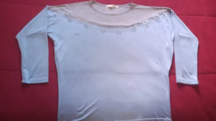 Blusa feminina. Tamanho GG