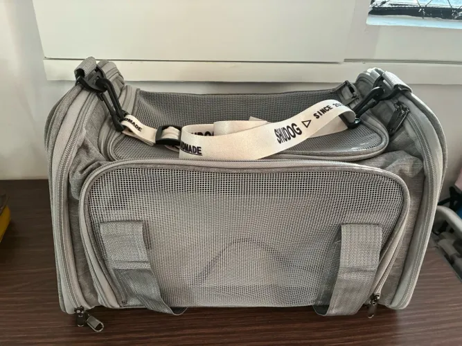 Bolsa transporte de animais e grade de protecao porta