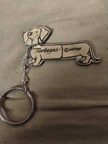 Chaveiro Cofap cachorrinho amortecedor turbogas dourado