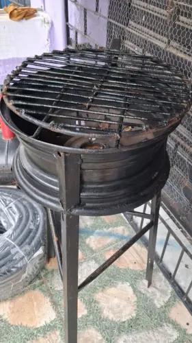 Vendo churrasqueira  aro de carro com regulagem