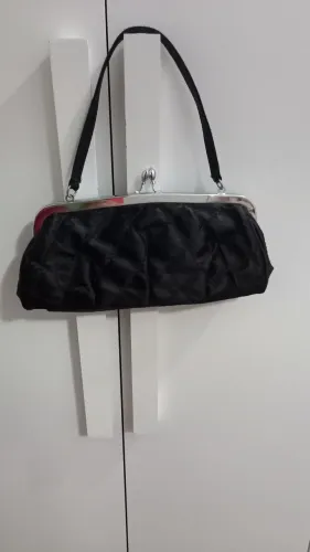 Vendo uma bolsa de festa.