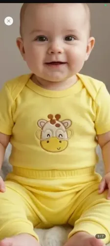 Bordado para confecção de roupa de bebê
