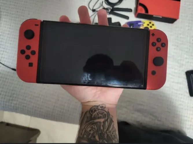 Nintendo switch oled bloqueado edição limitada de mario run