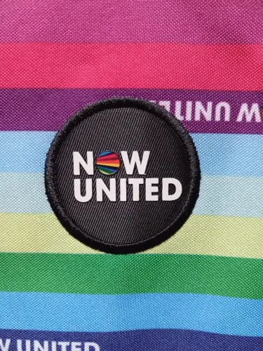 Mochila colorida Now United