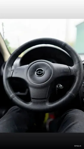 Revestimento de volante costurado 