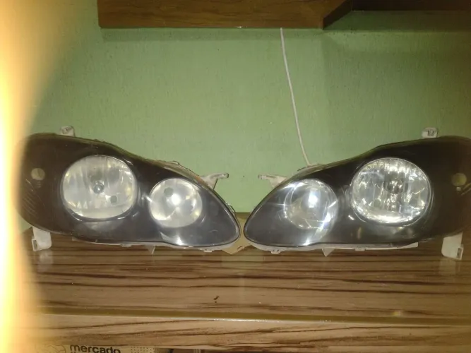 PAR FARÓIS ORIGINAIS COROLLA BRAD