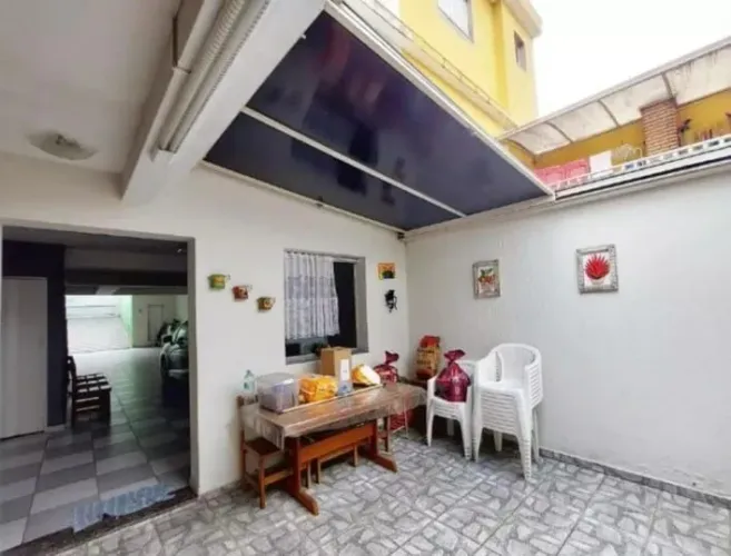 Sobrado com 3 dormitórios à venda, 226 m² por R$ 1.150.000,00 - Parque Jaçatuba - Santo An