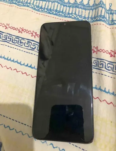 Celular moto e20 ,32 GB , funcionando perfeitamente..