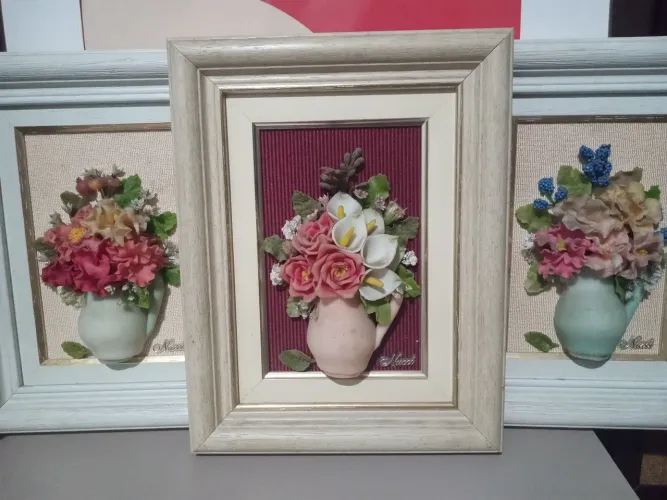 Kit com 3 quadros floridos ....