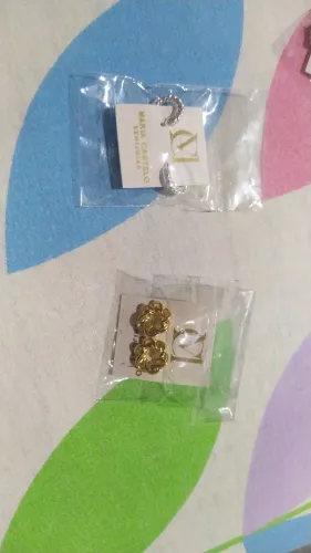 Semi joia banhado a ouro e prata com um ano de garantia da Maria Castelo