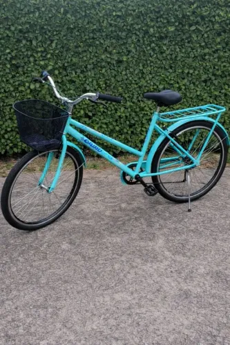Bicicleta azul tiffany com nota