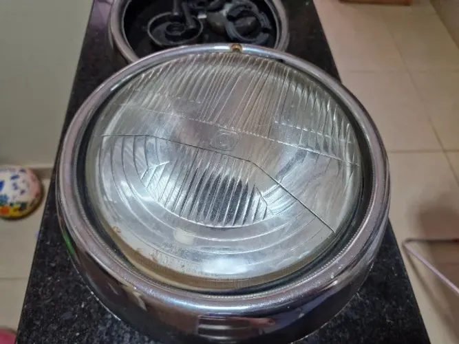 Farol de fusca com 2 aros em plástico cromo