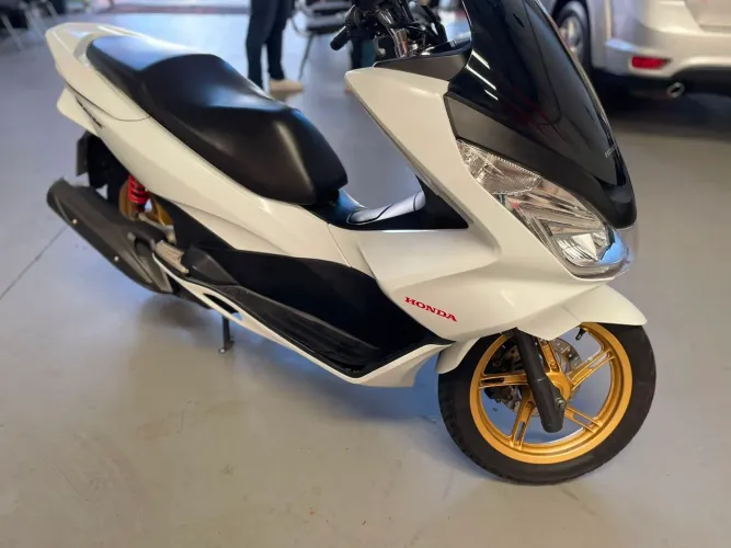 Em esselente estado de conservação  moto muito nova
