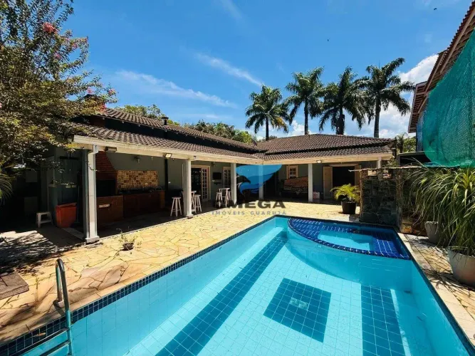 Casa à venda em Condomínio Pernambuco I no Guarujá | Omega Imóveis