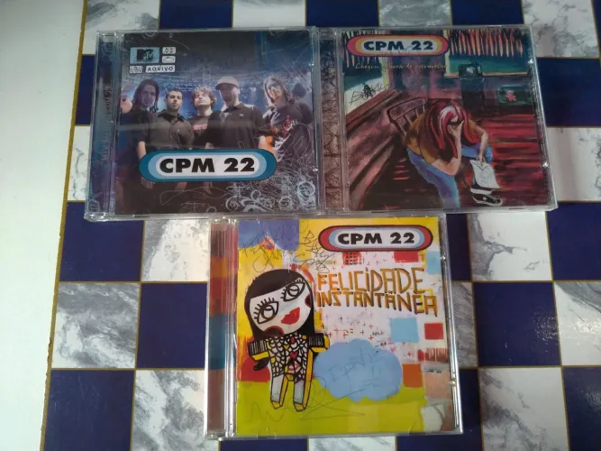 Cds autografados Cpm 22 com baqueta do Japinha