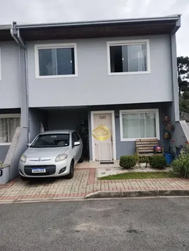 Sobrado com 3 dormitórios à venda, 79 m² por R$ 410.000,00 - Tindiquera - Araucária/PR