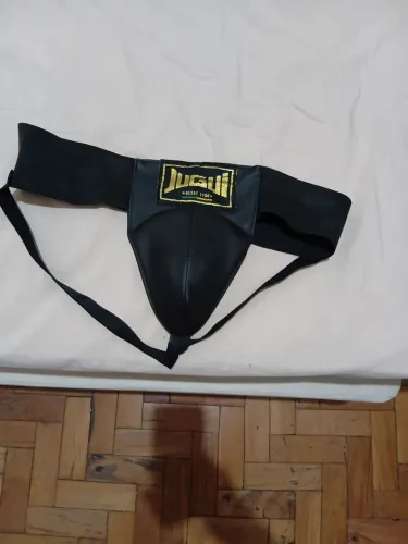 Coquilha jugui oficial  nova nunca usada 