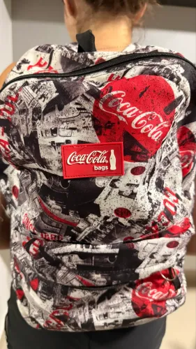 Mochila escolar da coca cola
