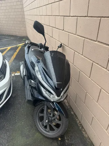 Moto impecável