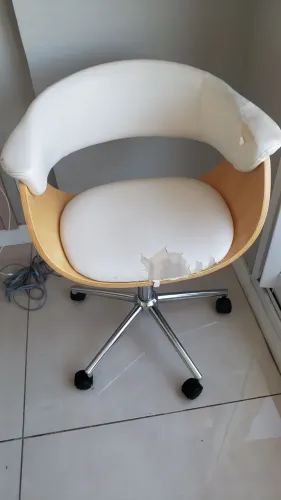 Cadeira usada para estética ou escritório.