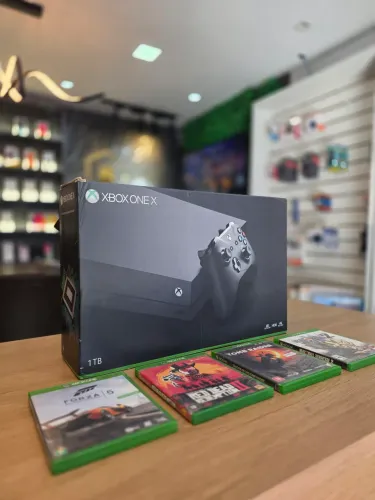 Xbox one x 512 gb ssd + 3 jogos