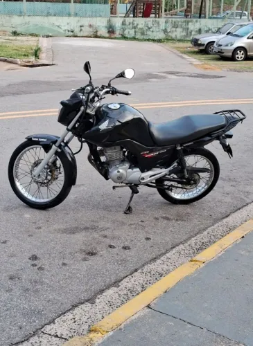 Troco moto por carro