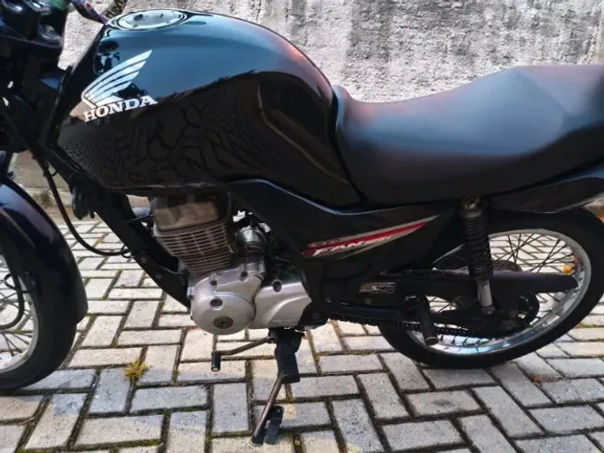 Moto fan125i com partida eletrica,ótima, estado de zero.